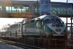 Inbound commuter makes its station stop